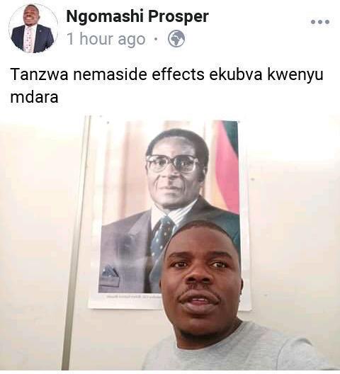 Comic Pastor Standing In Front Of Picture Of Mugabe