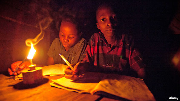 Students studying in the dark due to Zesa Load Shedding