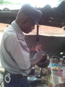 ZRP Officer On Duty Eating Sadza