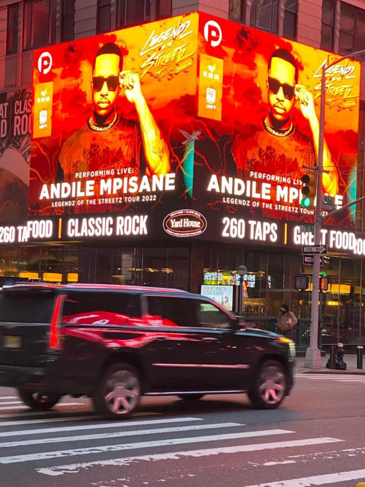 Andile Mpisane on A Times Square Billboard