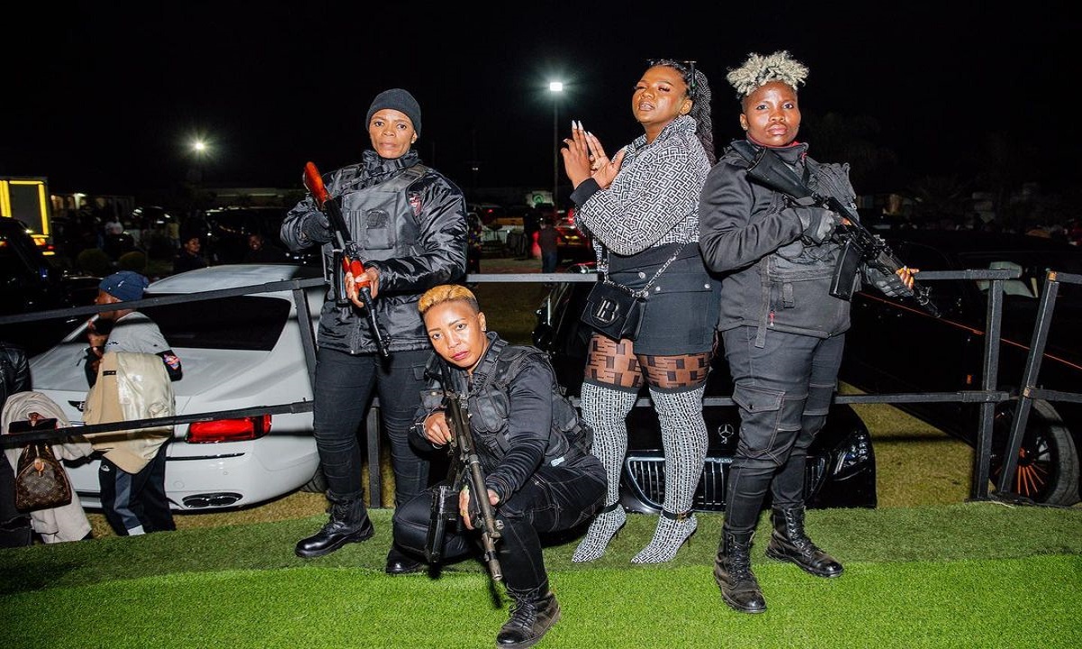 Shauwn Mkhize with guards