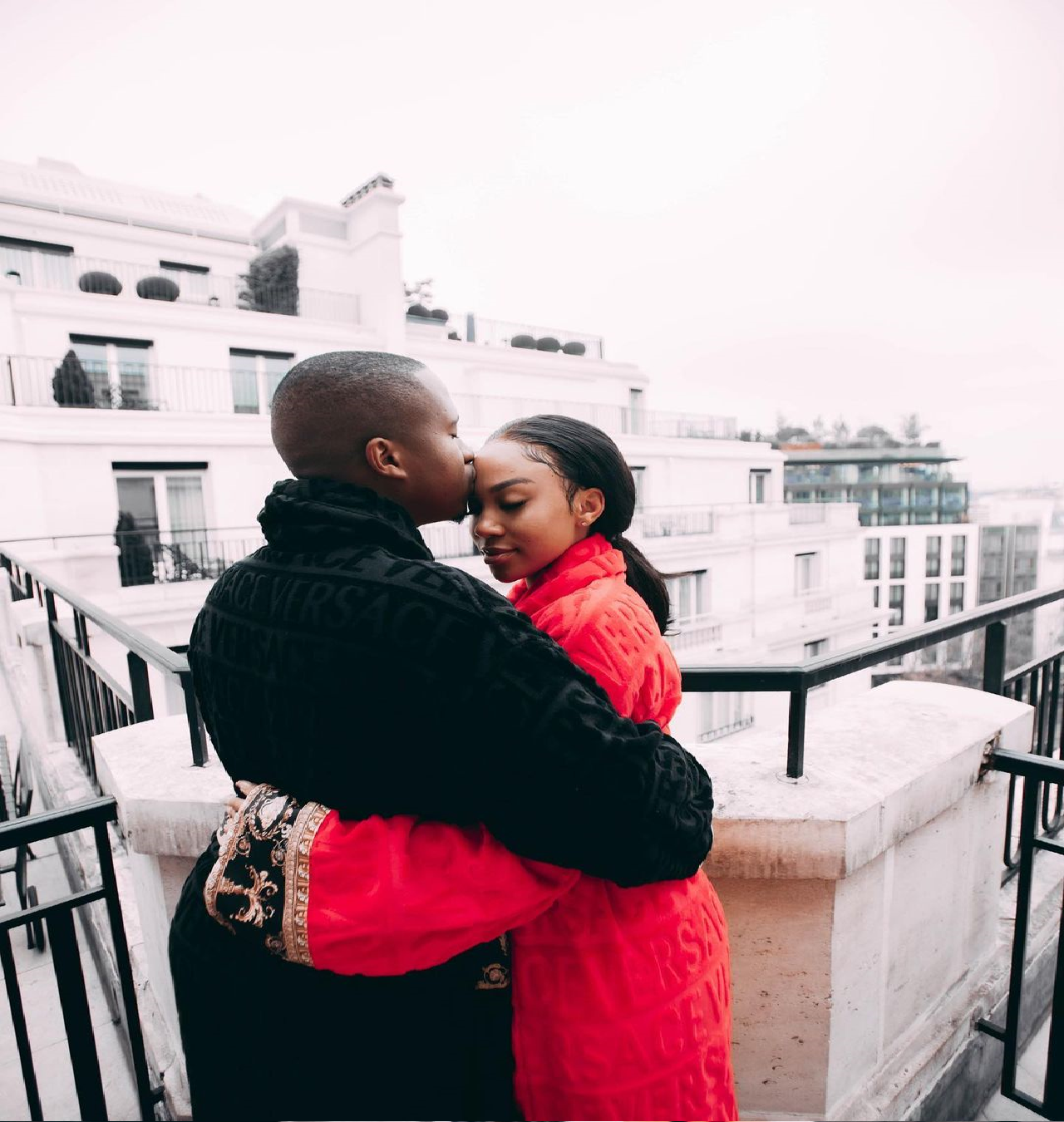 Andile and Tamia kissing in France